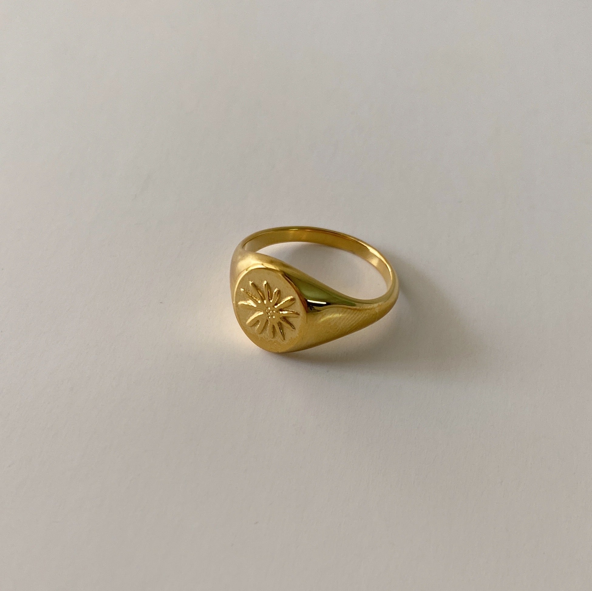 Anillo sello flor
