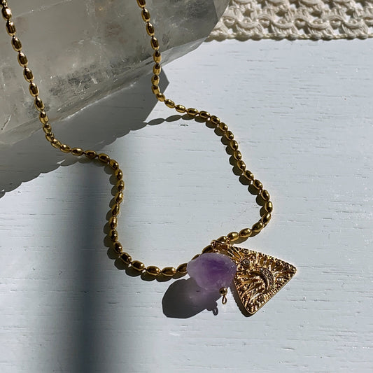 Collar medalla ojo