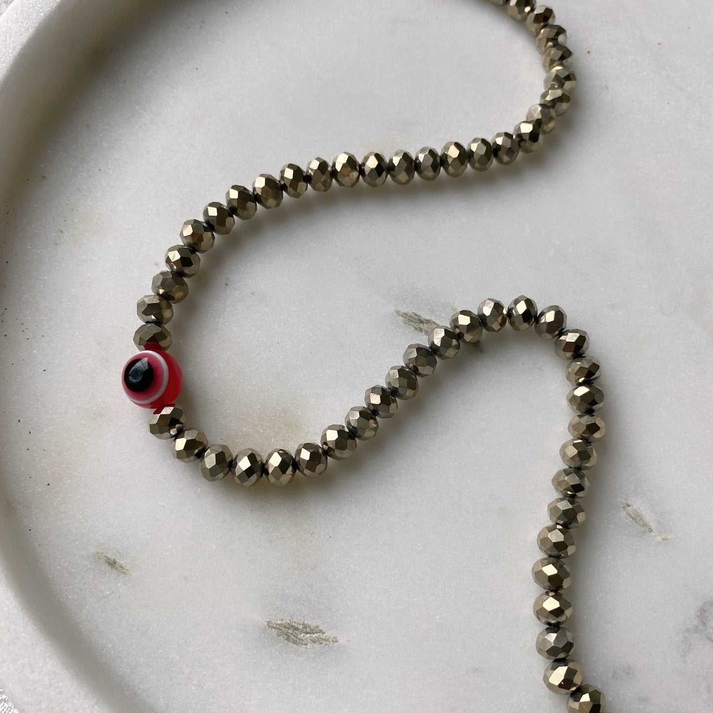 Collar cristal ojo rojo