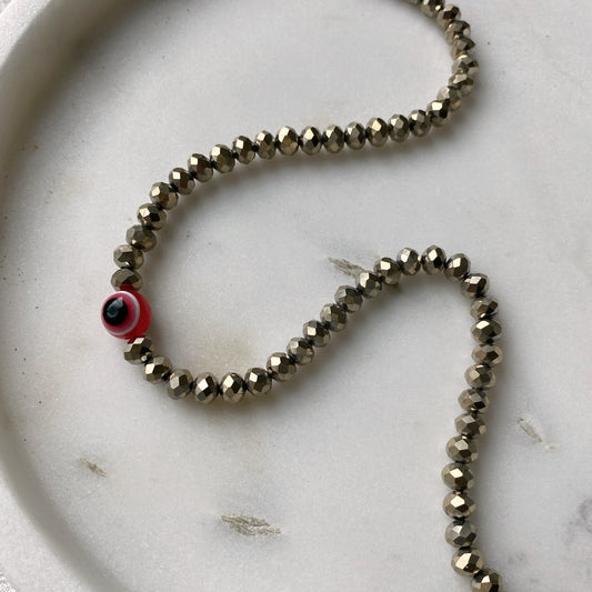 Collar cristal ojo rojo