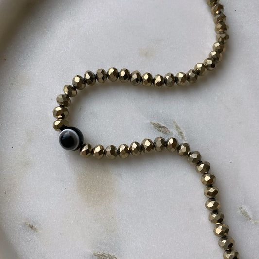 Collar cristal ojo negro