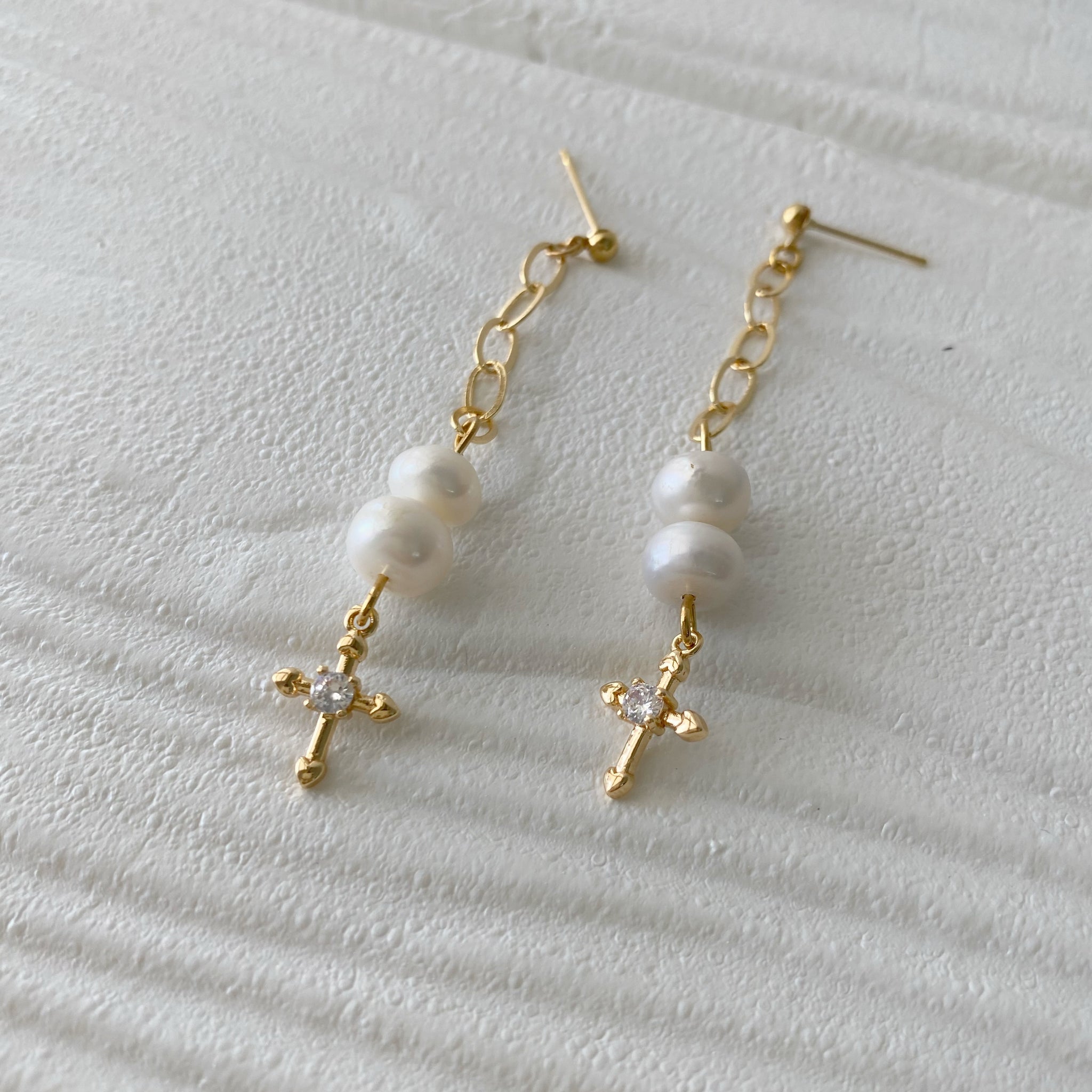 Aretes cruz cristal