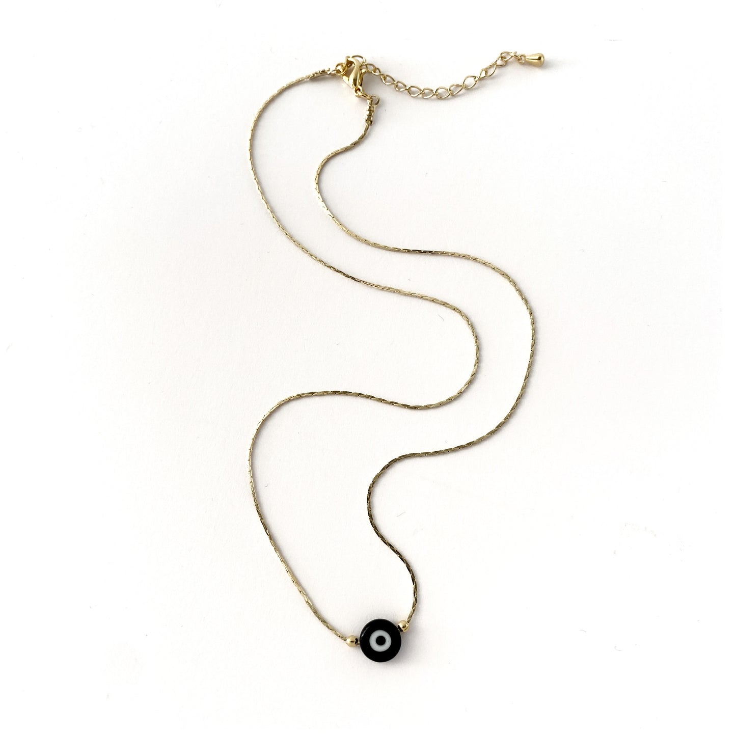 Collar ojito plano