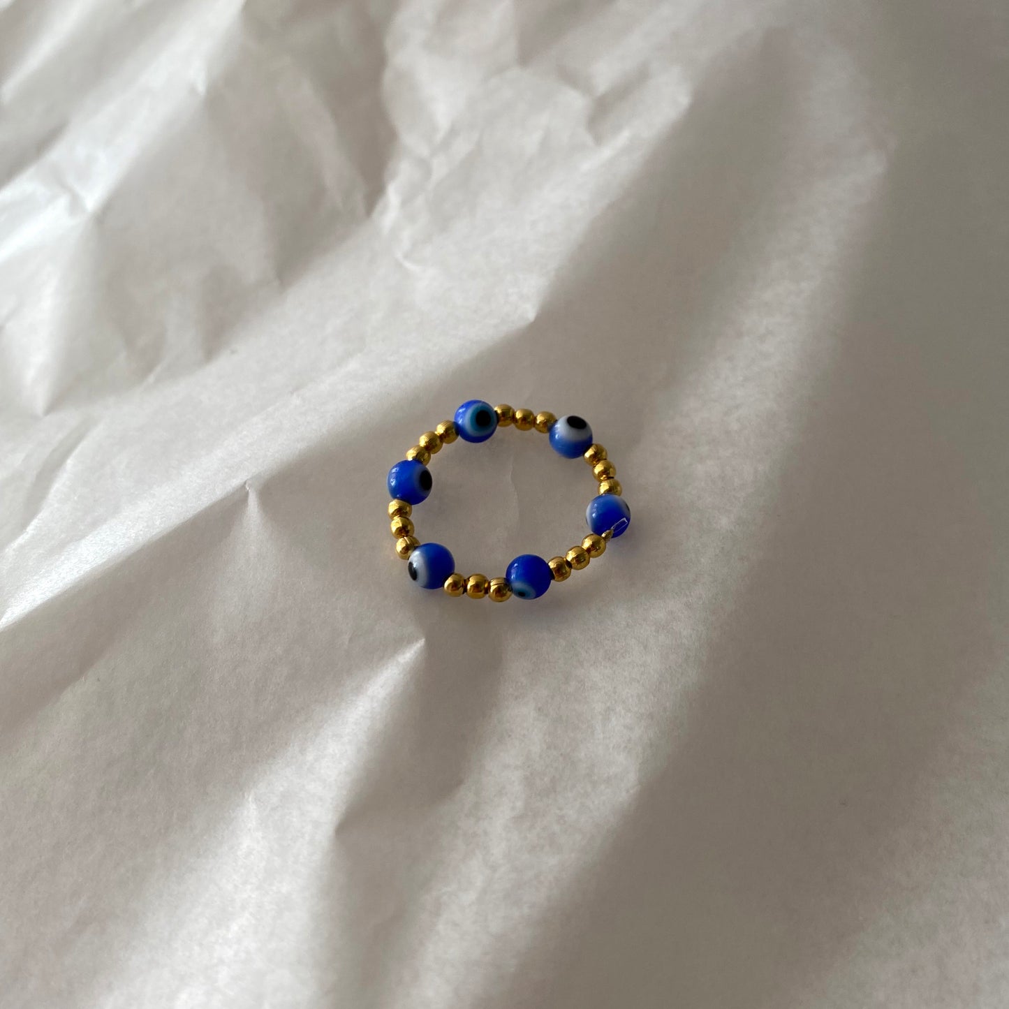 Anillo ojitos azul