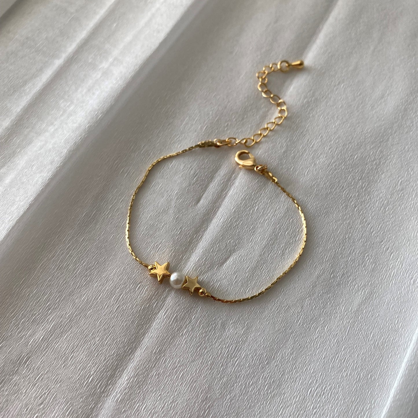 Pulsera doble estrella