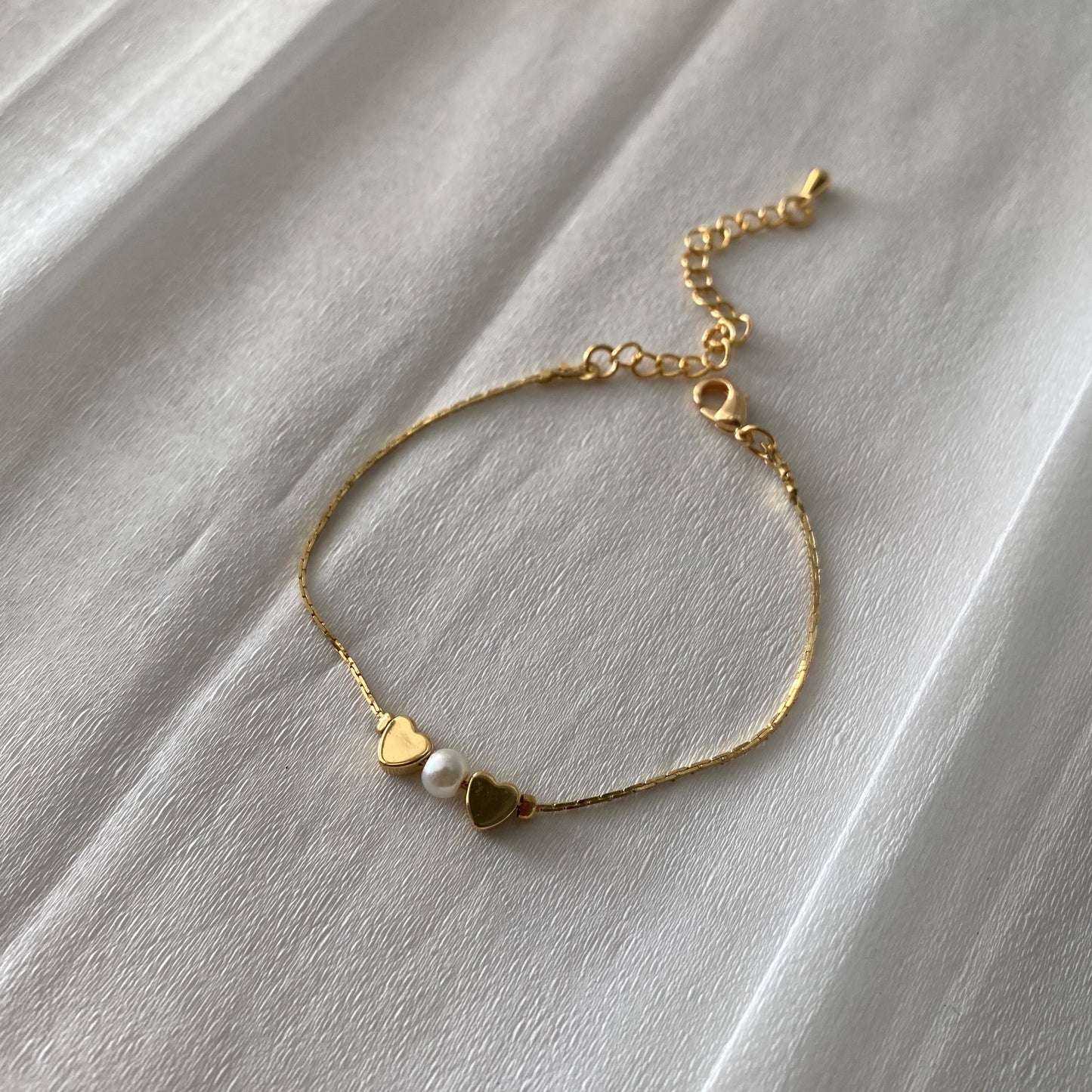 Pulsera corazón doble